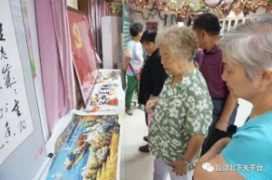 喜迎十九大南二社区举办群众文化节居民艺术展活动25.png